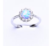 Zlatý prsten, bílé zlato, světle modrý syntetický opál, čiré zirkony, T 1495